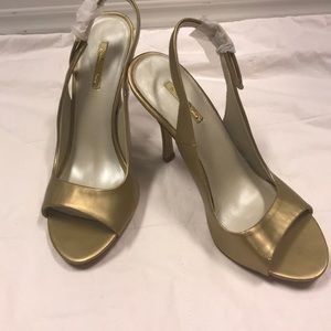 Brand new Michael Antonio gold heels size 6